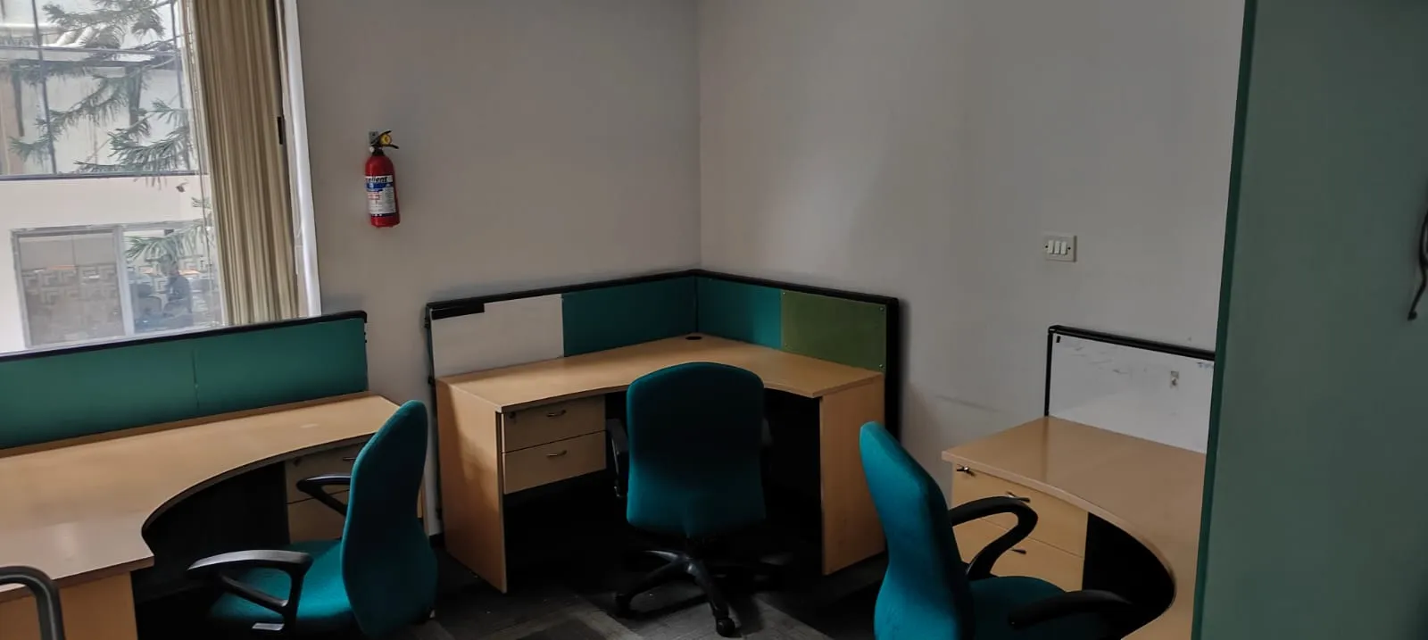 Mid-century modular executive layout with rolling office chairs ready for corporate office dismantling Marathahalli clearouts
